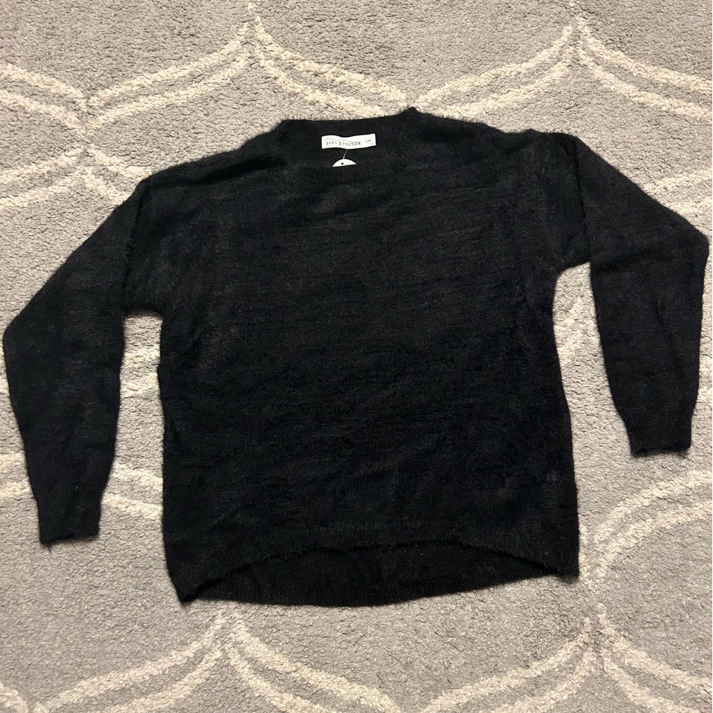 Brand. New long sleeve black sweater never worn